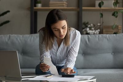 Female Student Balancing Budget